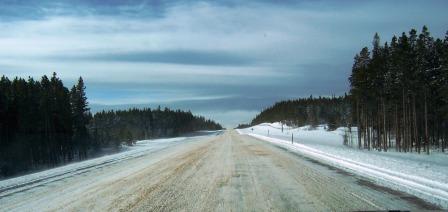 Snow covered highway by Fox Park Wyoming