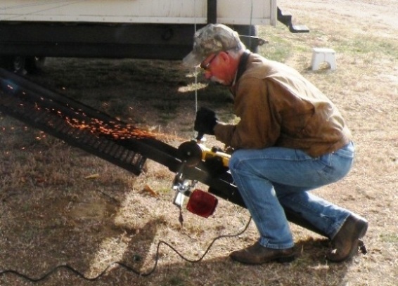 cutting off the first motorcycle carrier tie down