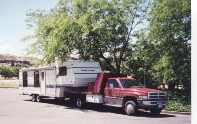 Dodge tow vehicle with a bed built to carry a motorcycle